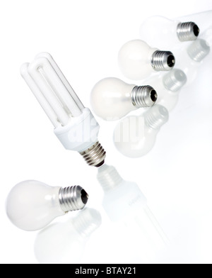 one new LED lamp and old incandescent light bulbs and used compact ...
