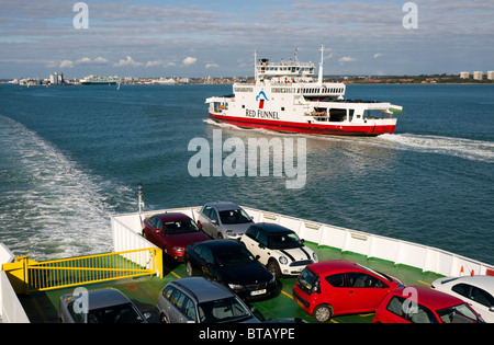 The Red Falcon, one of the ferries operated by Red Funnel, Passing Red Eagle, on Southampton Water Stock Photo