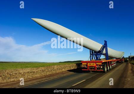 Giant blades for a wind turbine being transported by road in South Lanarkshire, Scotland Stock Photo