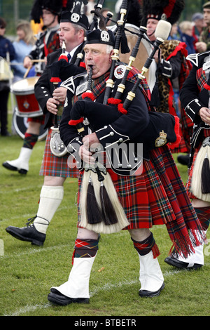 Scottish Highland Marching Band, Glenurquhart Highland Gathering and Games, Blairbeg Park, Drumnadrochit, Scotland Stock Photo