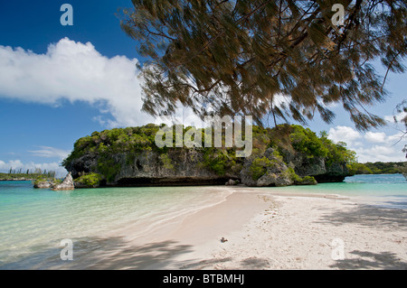 Sacred Rock in Kanumera Bay, Isle of Pines, New Caledonia, South Pacific Stock Photo