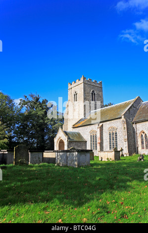 The tower and south porch of the Church of Saint Mary Magdalene at Warham, Norfolk, England, United Kingdom. Stock Photo