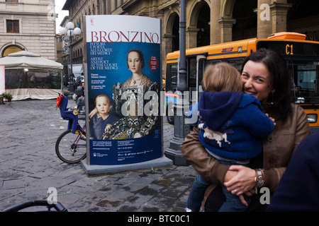 Modern Italian mother and child and Agnolo de Cosimo Bronzino's painting of the Medici Eleanora of Toledo and son Giovanni C1545 Stock Photo