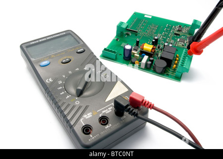 Isolated multimeter and printed circuit board for testing Stock Photo