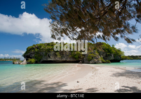 Sacred Rock in Kanumera Bay, Isle of Pines, New Caledonia, South Pacific Stock Photo