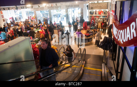 Shoppers and workers in the Aeropostale clothing store in Times