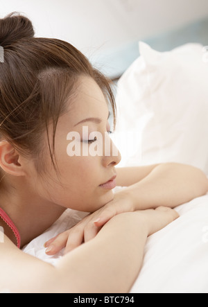 Close up of womans face sleeping Stock Photo