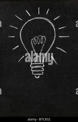 Light bulb drawn on a blackboard with copy space Stock Photo