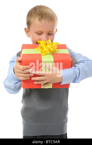 boy holding present box Stock Photo