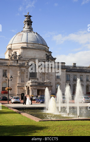 Cathays Park, Cardiff, Glamorgan, South Wales, UK. Wedding at City Hall civic centre with fountains outside Stock Photo