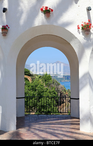 Panoramic view through the colonnade at the Balcon de Europa in Nerja, Spain Stock Photo