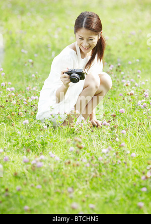 Young Japanese woman taking a walk Stock Photo - Alamy