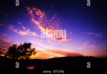 Sunset over Ullswater lake. The lake district. Cumbria. England. Golden clouds and beautiful deep blue sky. Stock Photo
