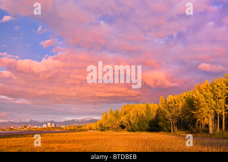 Sunset view of downtown Anchorage as seen from the Tony Knowles Coastal Trail, Anchorage, Southcentral Alaska, Fall Stock Photo
