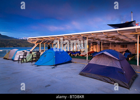 View of passengers tents on the solarium deck of the Alaska Marine Highway M/V Columbia Ferry in the Inside Passage, Alaska, Stock Photo