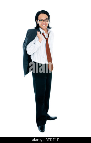 Young businessman smiling with his jacket over shoulder Stock Photo
