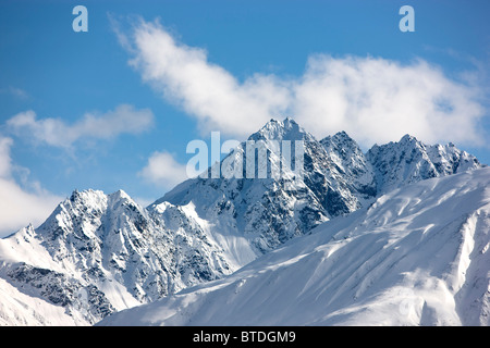 View of the North side of the Chugach Mountains along the Glenn Highway during Winter in Southcentral Alaska Stock Photo