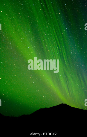 View of the Aurora Borealis over the Noatak River in Gates of the Arctic National Park and Preserve, Arctic Alaska, Fall Stock Photo