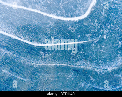 Abstract patterns in the ice during Winter along the Tony Knowles Coastal Trail, Anchorage, Southcentral Alaska Stock Photo