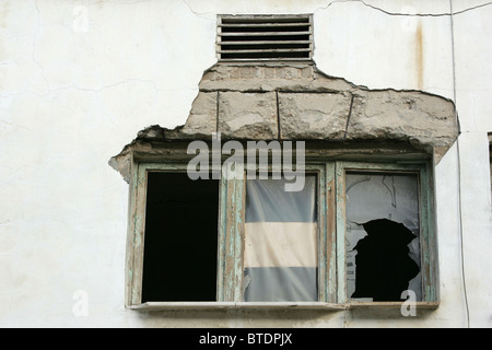 Window with broken glass Stock Photo