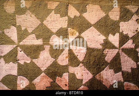 Textured green and white patterned  background of a wall Stock Photo
