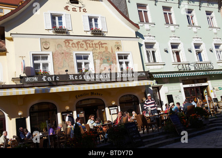 people sitting outside in cafe, Melk, Austria Stock Photo
