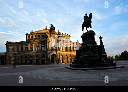 Altstadt Dresden Baroque architectural style Semperoper Saxony State opera house in Theaterplatz with statue of King Johann Stock Photo