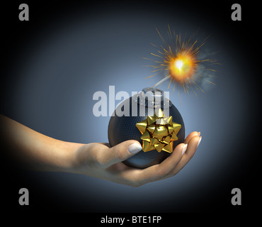 Hand holding a bomb with sparkling riot, with a gift rosette on it. Stock Photo