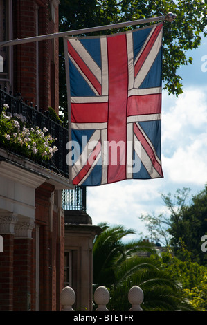 British Union flag hanging in an affluent London street. UK Stock Photo