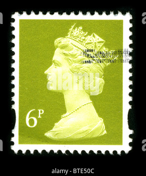 UNITED KINGDOM - CIRCA 1990: An English Used First Class Postage Stamp showing Portrait of Queen Elizabeth in gold circa 1990. Stock Photo