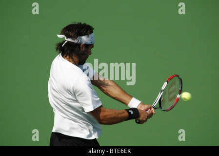 Fritz Wolmarans of South Africa hits a backhand during a qualifying match at the Legg Mason Tennis Classic July 28, 2007 Stock Photo