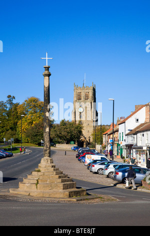Bedale Market Cross and Church North Yorkshire England Stock Photo