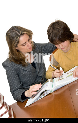 Mother helping her child with the homework Stock Photo