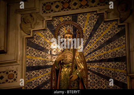 A sculpture of Saint Jude Thaddeus is displayed in the main altar of San Hipolito's church in Mexico City Stock Photo