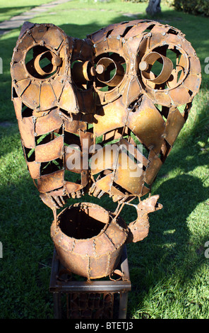 welded steel garden sculpture of owls Stock Photo