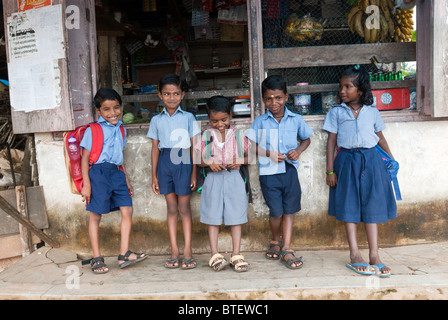 Children waiting to go to school, Alappuzha, Kerala, India. Stock Photo