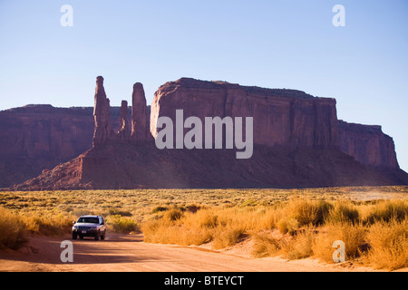A Jeep driving through Monument valley - Utah USA Stock Photo