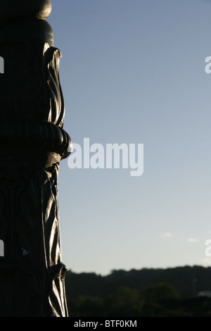 close up detail of one street lamp post pole and blue sky Stock Photo