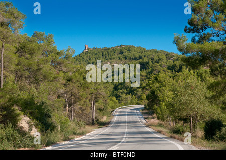 Lonely road leading to the mountain Stock Photo