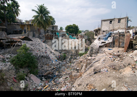 An incomplete drainage canal filled with rubbish in Port au Prince showing Stock Photo