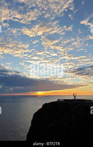 People gathering on the North Cape to watch the Midnight Sun. Finnmark, North Norway Stock Photo