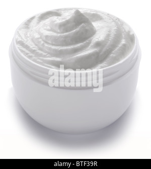 Opened plastic container with cream on a white background. Stock Photo