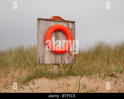 Life Buoy on Embleton Beach, Northumberland Stock Photo