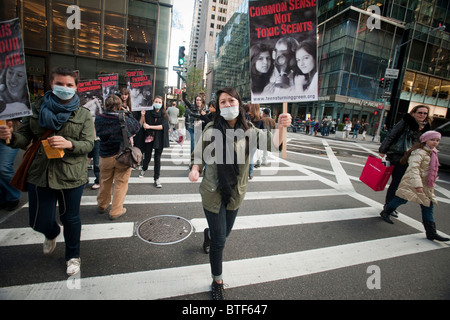 Teens Turning Green and their supporters protest in front of the Abercrombie & Fitch clothing store on Fifth Ave. in New York Stock Photo