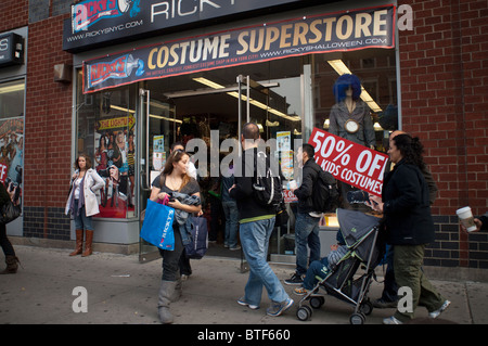 Ricky's Costume Superstore in the Chelsea neighborhood of New York advertises fifty percent off all children's costumes Stock Photo