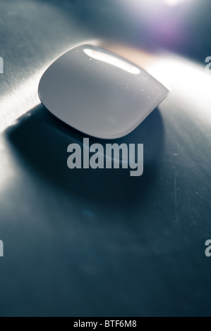 Apple magic mouse on smooth surface Stock Photo