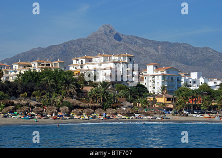 Holidaymakers on the beach, Puerto Banus, Marbella, Costa del Sol, Malaga Province, Andalucia, Spain, Western Europe. Stock Photo