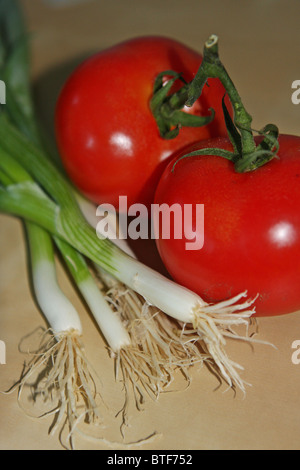red tomato, green scallion, vegetable, garden, veggies Stock Photo