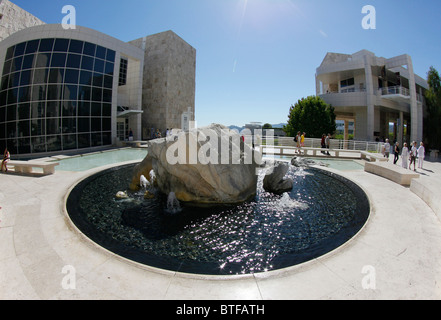 A sunlit view of the interior courtyard with the pool and fountains and sun reflections at the Getty Center in Los Angeles, CA Stock Photo