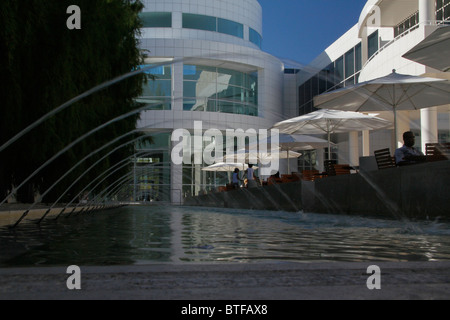 A view of the interior courtyard café of the Getty Center through the arches of water fountain Stock Photo